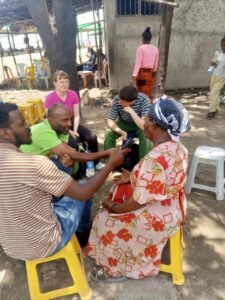 Real impact at the household level. A widowed woman at Hawassa fish market using a low-smoke brick stove built from local materials.